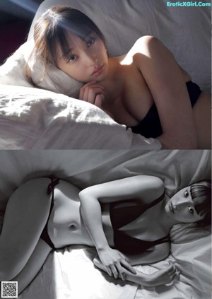 A woman in a blue lingerie sitting on a bed.