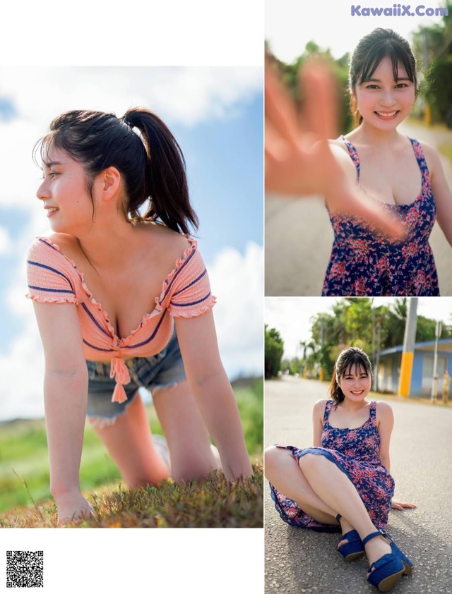 A woman in a blue dress sitting on the ground.